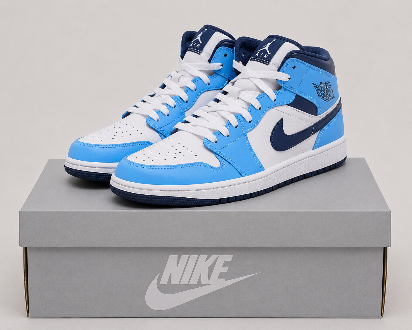 Jordan Air 1 Mid ( UNIVERSITY BLUE ) image 2
