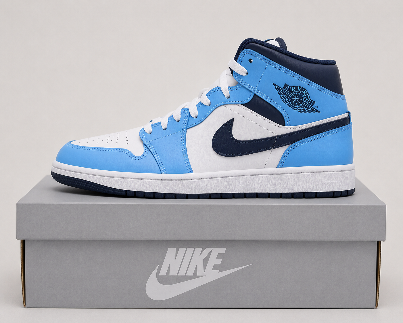 Jordan Air 1 Mid ( UNIVERSITY BLUE )